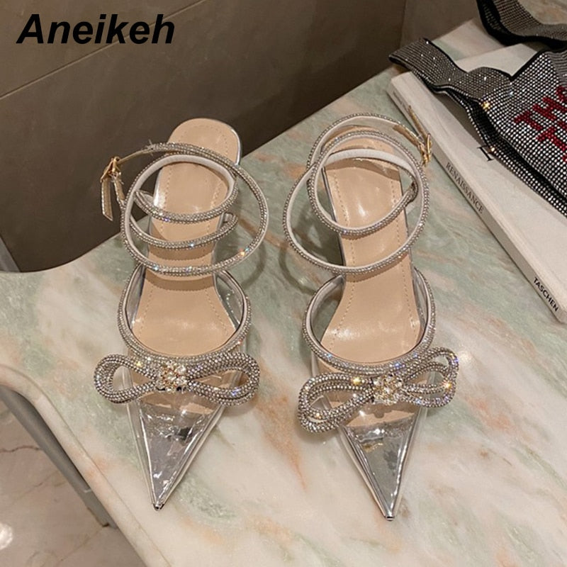Crystal butterfly knot pointed toe pumps