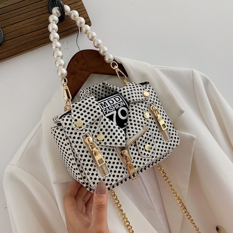 Mini jacket crossbody bag with chain and pearls details